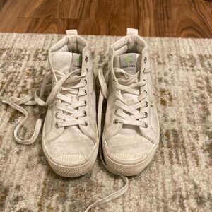 White Cariuma canvas high tops
